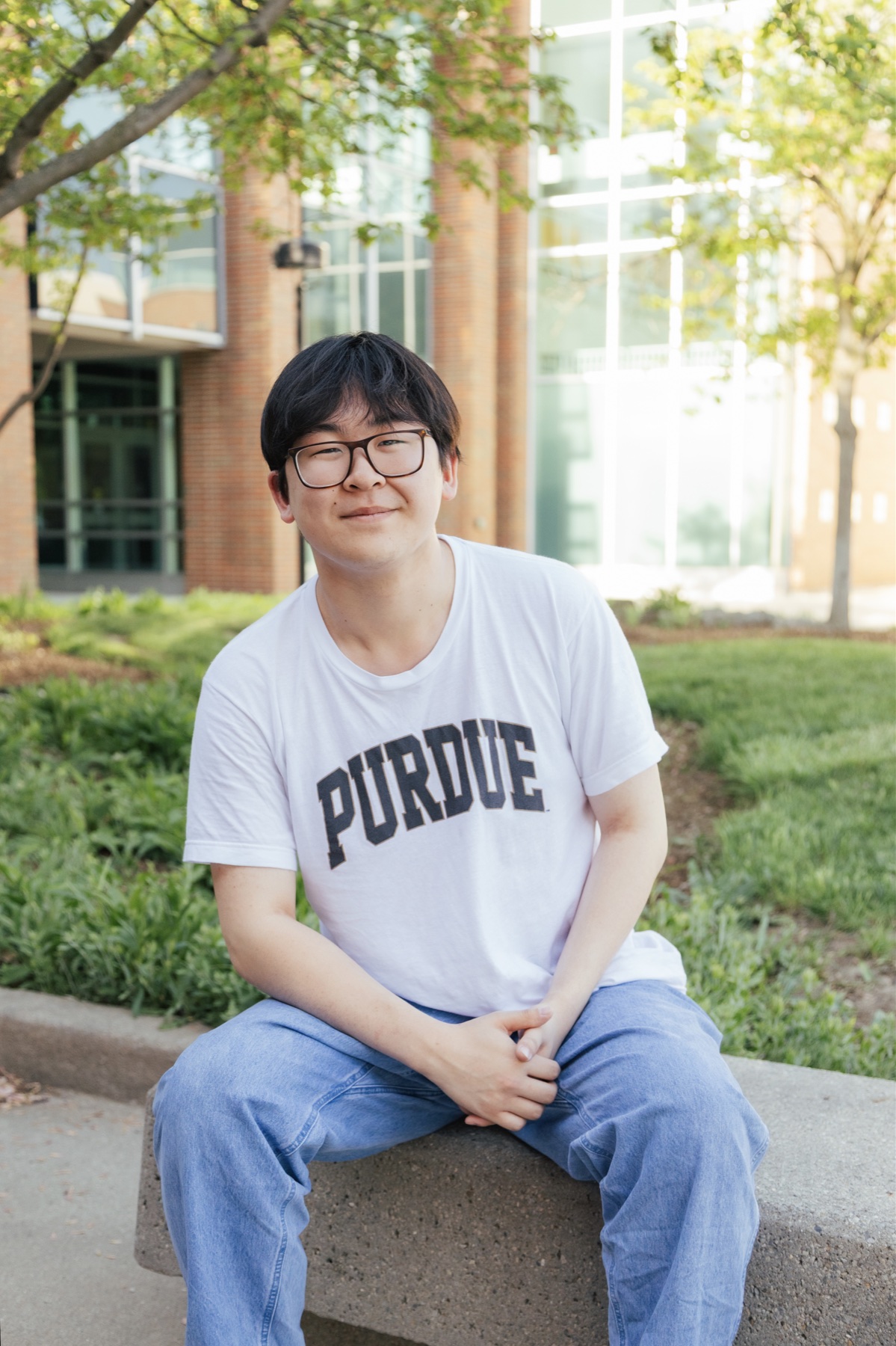 Ethan wearing a Purdue shirt on campus